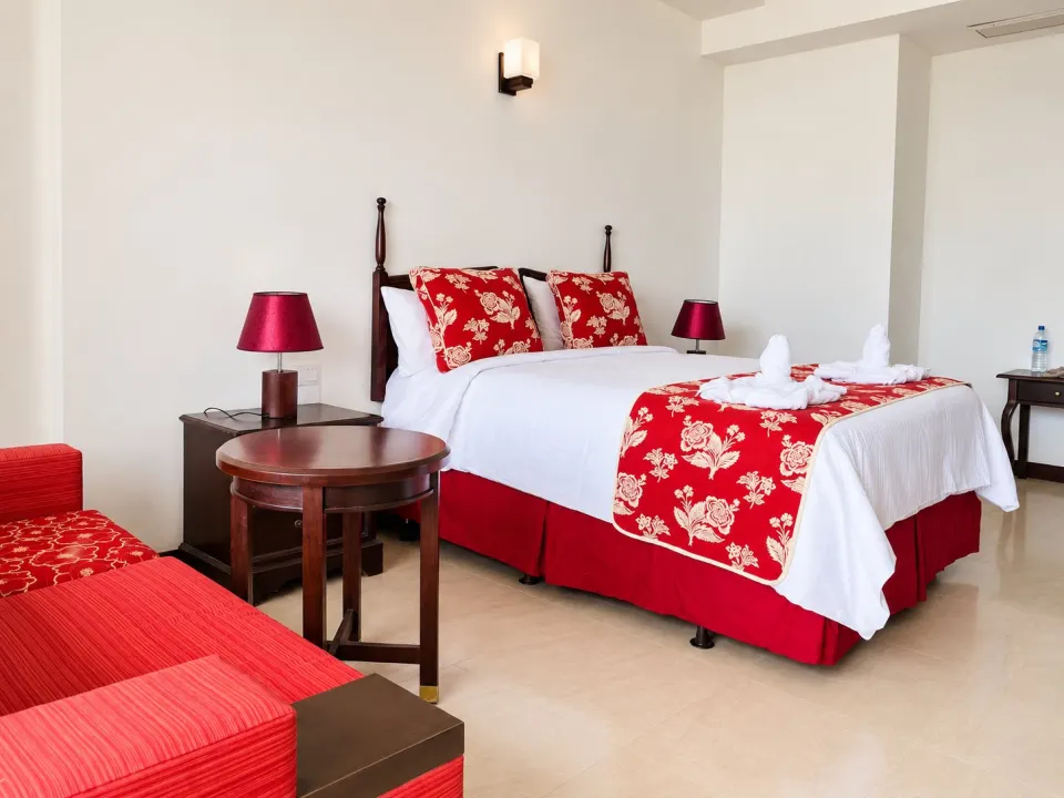 Elegant Red-Accented Hotel Bedroom