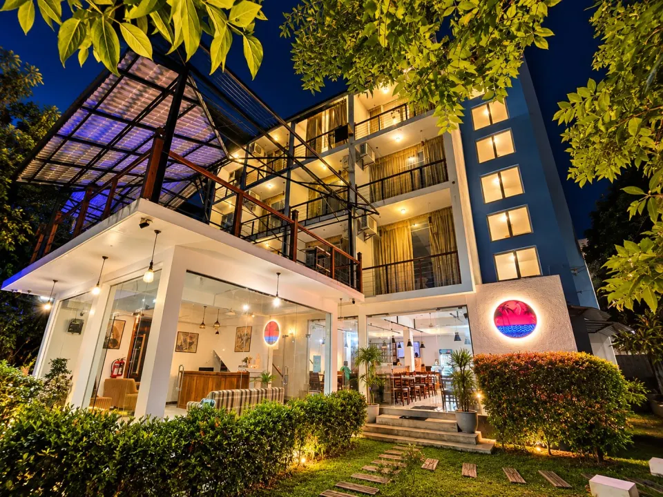 Warmly Lit Nighttime Boutique Hotel