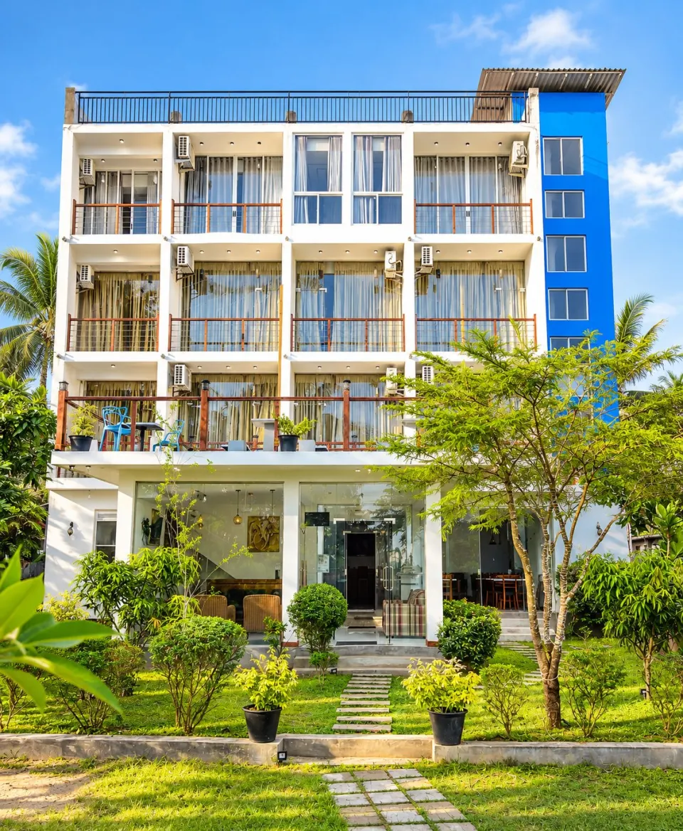 Bayfront Weligama by day, with balconies above the garden
