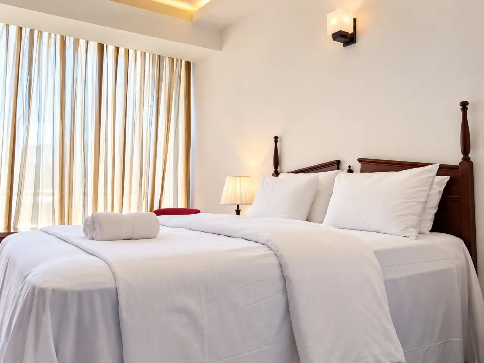 Luxury Sea Front with Private Balcony: bright modern hotel bedroom