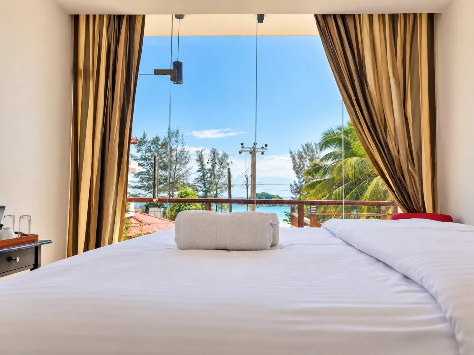 Luxury Sea Front with Private Balcony: serene tropical seaside hotel room